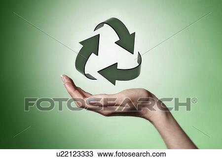 Hand holding recycle symbol View Large Photo Image Stock Image - Hand holding recycle symbol. Fotosearch