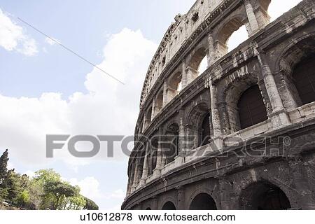 Stock Photo - Low angle view of Coliseum in Rome. Fotosearch