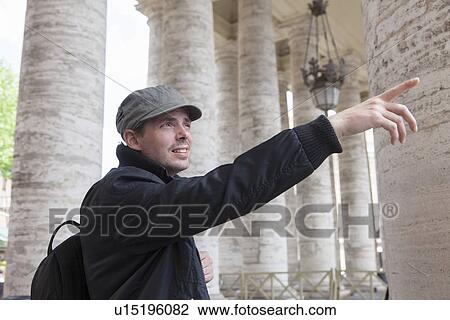 Man admiring architecture, St Peter's Square, Vatican City View Large Photo Image Stock Image - Man admiring architecture, St Peter's Square, Vatican City. Fotosearch
