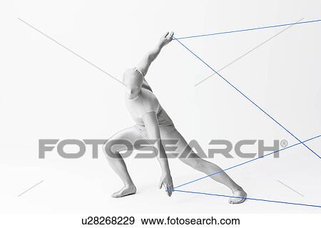 Stock Photo - Man in bodysuit playing with string. Fotosearch