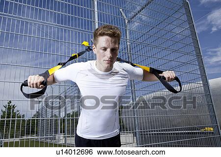 Man working out in industrial area View Large Photo Image Stock Photograph - Man working out in industrial area. Fotosearch