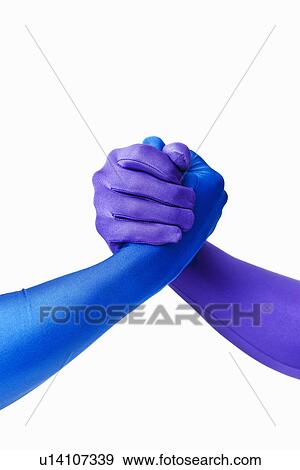 Men in bodysuits arm wrestling View Large Photo Image Stock Photo - Men in bodysuits arm wrestling. Fotosearch