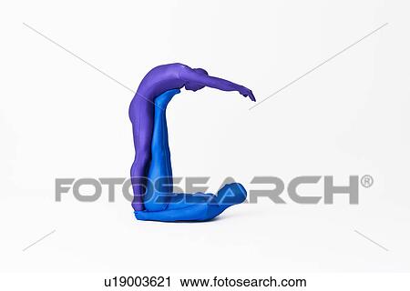 Stock Image - Men in bodysuits making the letter C. Fotosearch