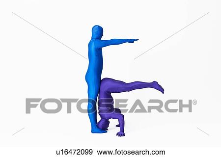 Men in bodysuits making the letter F View Large Photo Image Stock Photo - Men in bodysuits making the letter F. Fotosearch