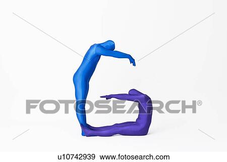Stock Photo - Men in bodysuits making the letter G. Fotosearch