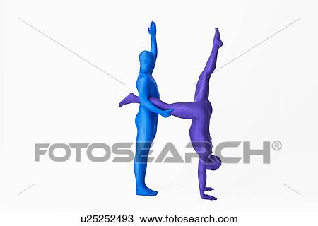 Men in bodysuits making the letter H View Large Photo Image Stock Image - Men in bodysuits making the letter H. Fotosearch