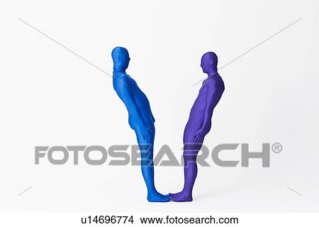 Picture - Men in bodysuits making the letter V. Fotosearch