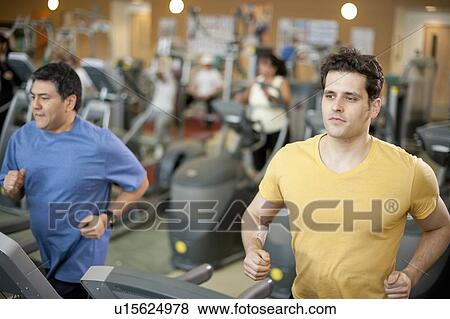 Men using treadmills in gym View Large Photo Image Stock Photo - Men using treadmills in gym. Fotosearch