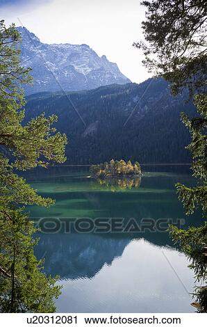 Mountains reflected in still lake View Large Photo Image Stock Image - Mountains reflected in still lake. Fotosearch