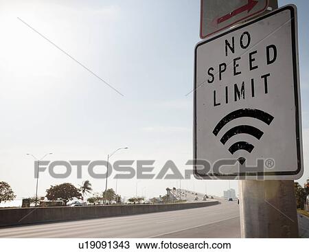 Stock Image - No speed limit sign on freeway. Fotosearch
