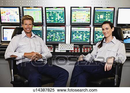 People working in security control room View Large Photo Image Stock Photography - People working in security control room. Fotosearch
