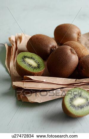 Pile of kiwis in paper View Large Photo Image Picture - Pile of kiwis in paper. Fotosearch