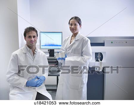 Scientist using computer in lab View Large Photo Image Stock Image - Scientist using computer in lab. Fotosearch