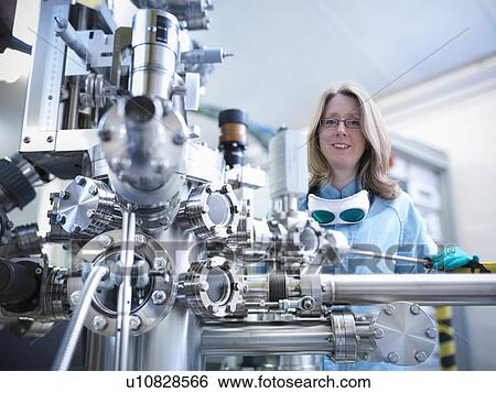 Scientist using vacuum chamber in lab View Large Photo Image Stock Photograph - Scientist using vacuum chamber in lab. Fotosearch