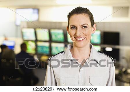 Security personnel in control room View Large Photo Image Stock Photo - Security personnel in control room. Fotosearch