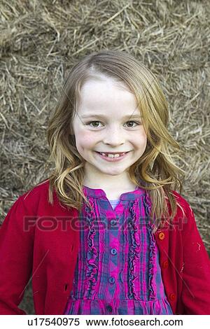 Smiling girl standing outdoors View Large Photo Image Stock Photography - Smiling girl standing outdoors. Fotosearch