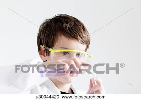 Student pouring liquid into test tubes View Large Photo Image Stock Image - Student pouring liquid into test tubes. Fotosearch