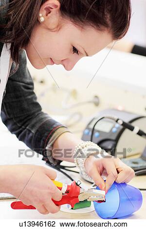 Stock Image - Student working in technology lab. Fotosearch