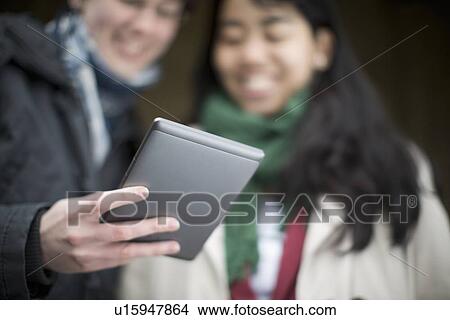 Students using tablet computer View Large Photo Image Picture - Students using tablet computer. Fotosearch