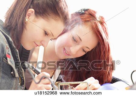 Stock Photo - Students working in technology lab. Fotosearch