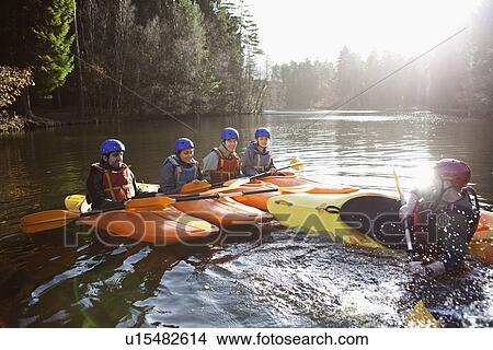 Teacher capsizing kayak in still lake View Large Photo Image Picture - Teacher capsizing kayak in still lake. Fotosearch