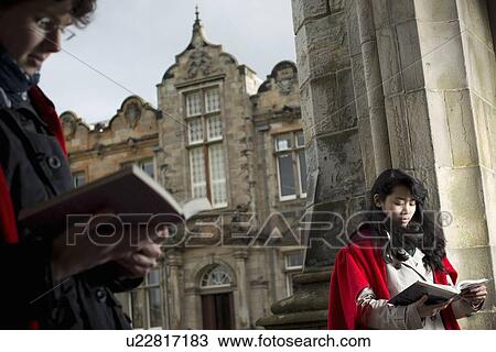 Stock Image - University students in traditional capes. Fotosearch