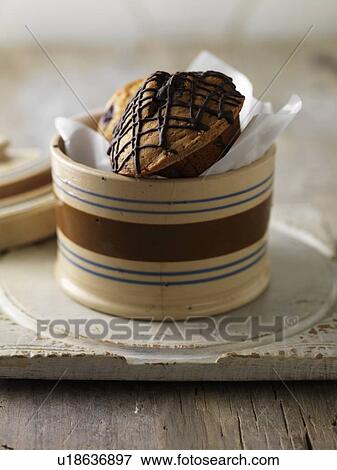 Various muffins in jar View Large Photo Image Stock Photo - Various muffins in jar. Fotosearch