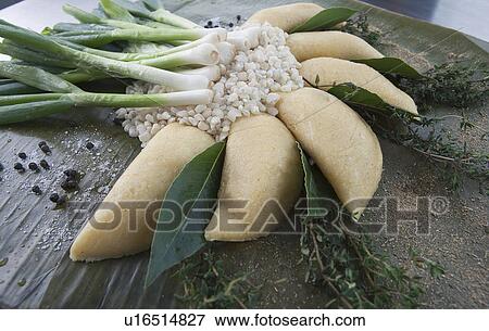 Vegetables and grains on wrapper with empanadas (Latin American pasties) View Large Photo Image Stock Photo - Vegetables and grains on wrapper with empanadas (Latin American pasties). Fotosearch