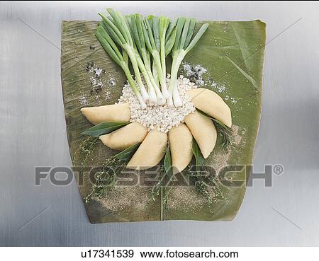 Vegetables and grains on wrapper with empanadas (Latin American pasties) View Large Photo Image Stock Photo - Vegetables and grains on wrapper with empanadas (Latin American pasties). Fotosearch