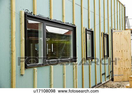 Stock Photo - Windows of building under construction. Fotosearch