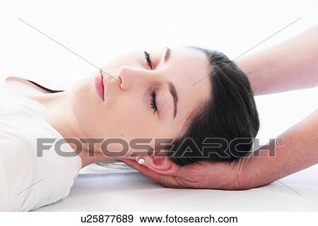 Woman having scalp massage in spa View Large Photo Image Stock Photo - Woman having scalp massage in spa. Fotosearch