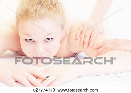 Woman having shoulder massage in spa View Large Photo Image Stock Image - Woman having shoulder massage in spa. Fotosearch
