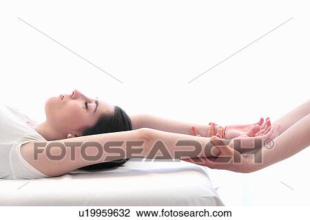 Woman having wrist massage in spa View Large Photo Image Stock Image - Woman having wrist massage in spa. Fotosearch