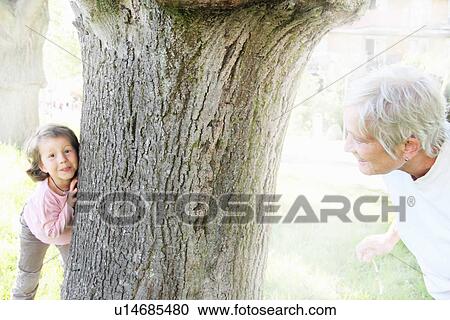 Woman playing with granddaughter View Large Photo Image Stock Image - Woman playing with granddaughter. Fotosearch