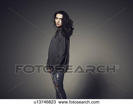 Woman wearing baggy sweatshirt View Large Photo Image Stock Image - Woman wearing baggy sweatshirt. Fotosearch