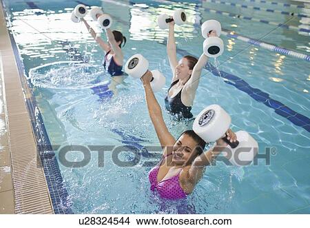 Women exercising in indoor pool View Large Photo Image Picture - Women exercising in indoor pool. Fotosearch