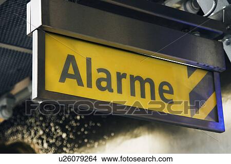 Alarm sign at a railroad station, Paris, France View Large Photo Image Picture - Alarm sign at a railroad station, Paris, France. Fotosearch