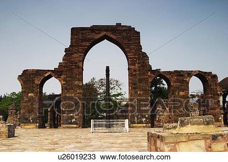 Arcade in front of a pillar, Ashoka Pillar, Qutub Minar, Delhi, India View Large Photo Image Stock Image - Arcade in front of a pillar, Ashoka Pillar, Qutub Minar, Delhi, India. Fotosearch