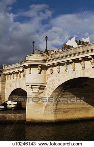 Arch bridge across the river, Pont Neuf, Seine River, Paris, France View Large Photo Image Stock Image - Arch bridge across the river, Pont Neuf, Seine River, Paris, France. Fotosearch