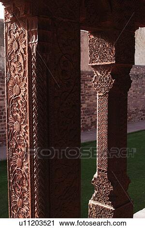 Stock Image - Architectural detail of columns in a palace, Fatehpur Sikri, Agra, Uttar Pradesh, India. Fotosearch