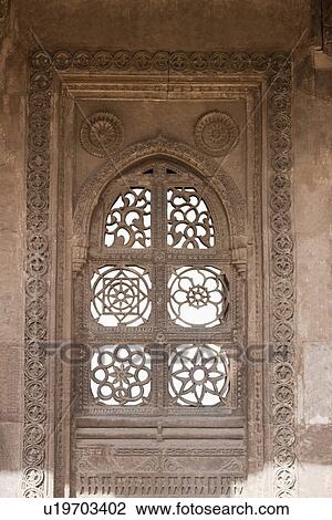 Stock Image - Architectural details of a mosque, Sayad Sidi Mosque, Ahmedabad, Gujarat, India. Fotosearch