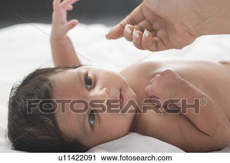 Baby looking at her mother View Large Photo Image Stock Image - Baby looking at her mother. Fotosearch