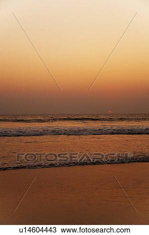 Stock Image - Beach at dusk, Goa, India. Fotosearch