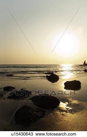 Beach at sunset, Goa, India View Large Photo Image Stock Image - Beach at sunset, Goa, India. Fotosearch
