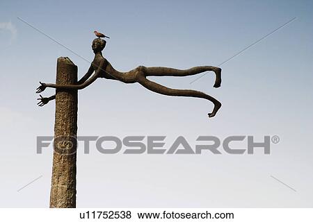 Bird perching on a sculpture, Garden of Five Senses, Saidul Ajaib, New Delhi, India View Large Photo Image Stock Photo - Bird perching on a sculpture, Garden of Five Senses, Saidul Ajaib, New Delhi, India. Fotosearch