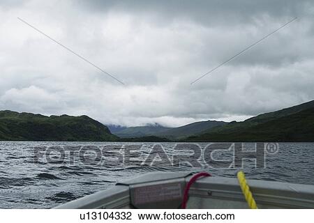 Boat in a lake, Lakes of Killarney, County Kerry, Republic of Ireland View Large Photo Image Stock Image - Boat in a lake, Lakes of Killarney, County Kerry, Republic of Ireland. Fotosearch