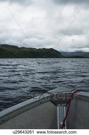 Stock Image - Boat in a lake, Lakes of Killarney, County Kerry, Republic of Ireland. Fotosearch