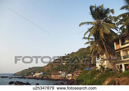 Stock Photo - Buildings at the coast, Goa, India. Fotosearch