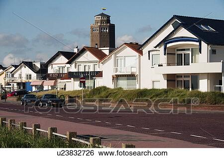 Stock Photograph - Buildings at the roadside, The Hague, Netherlands. Fotosearch
