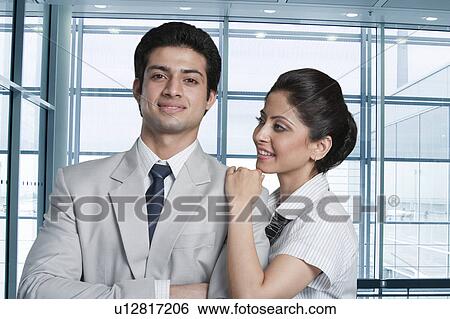 Business couple at an airport lounge View Large Photo Image Stock Photograph - Business couple at an airport lounge. Fotosearch